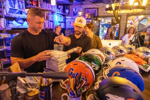 Tim-Tebow-Signs-Items-April-9th-2026-Thrivetime-Show-Business-Conference-April-2026-78